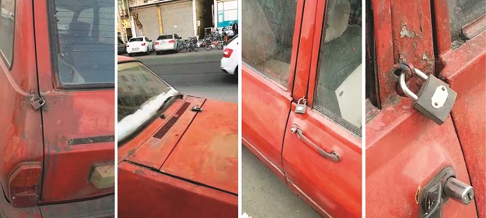 Otomobilin kapı ve kaputuna asma kilitli önlem