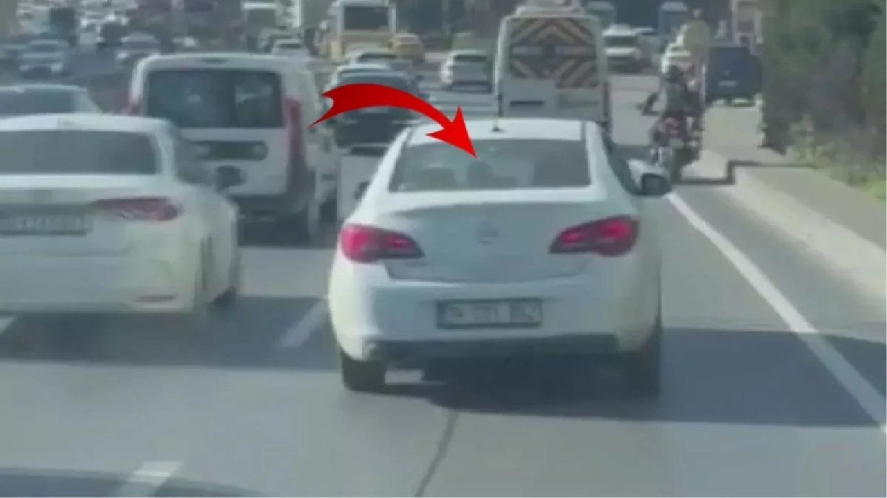 Araç içinde kadını darp edip trafiği tehlikeye attı