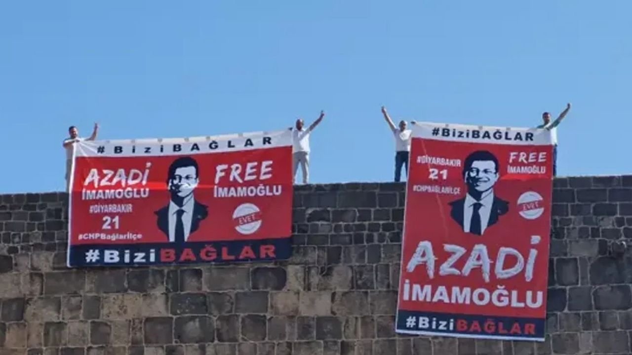 Diyarbakır Surlarına asılan İmamoğlu pankartlarına para cezası