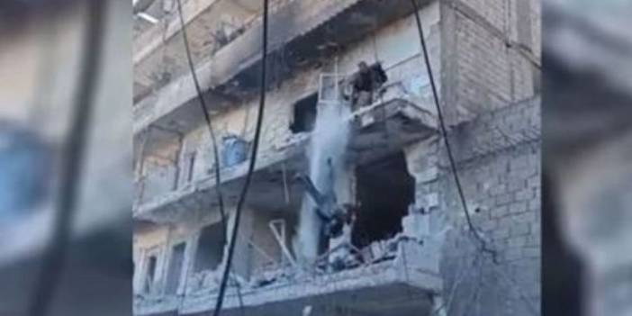 Halep'te savaş suçu: Ölen kadın savaşçı binadan atıldı